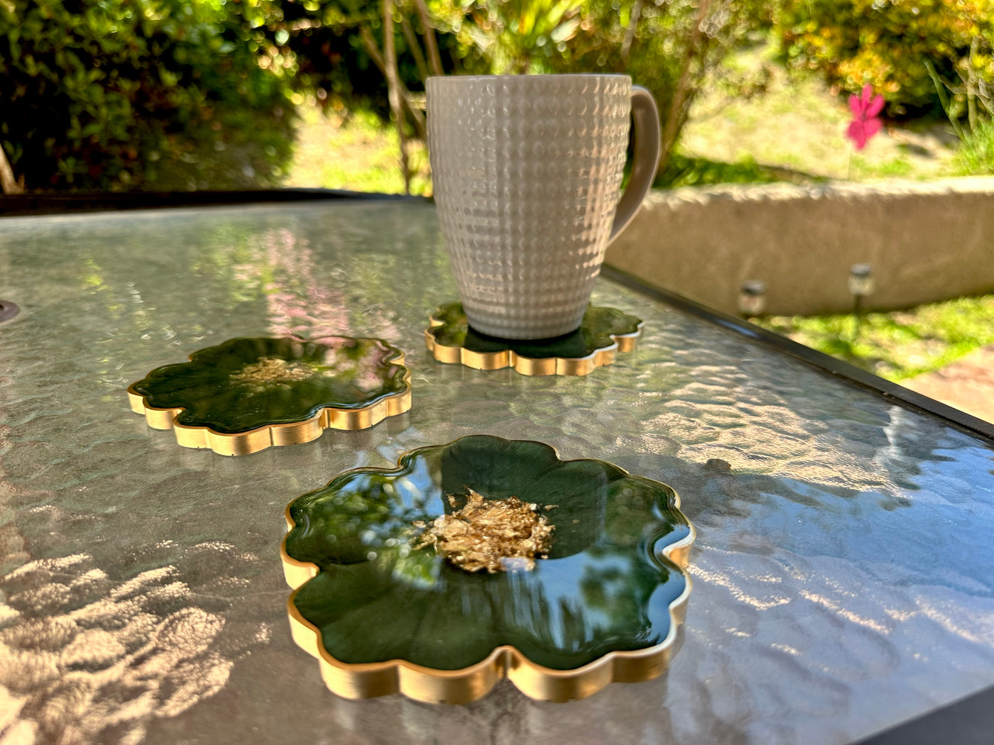 Handmade Forest Olive Green and Gold Resin Flower Shaped Coasters Set - Jasmin Renee Art - Three Coasters Gold Rim Edges with Cup on Table